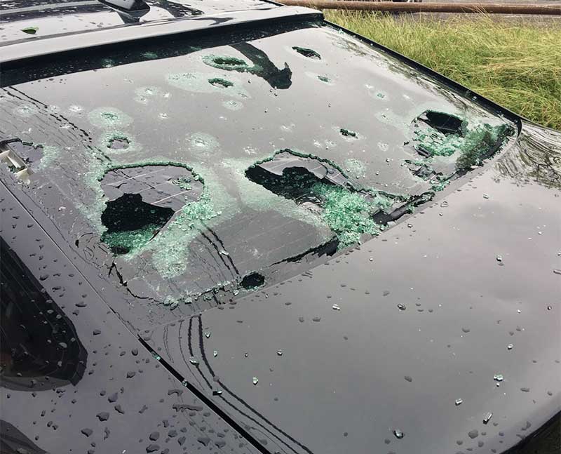 hail stone smashed car